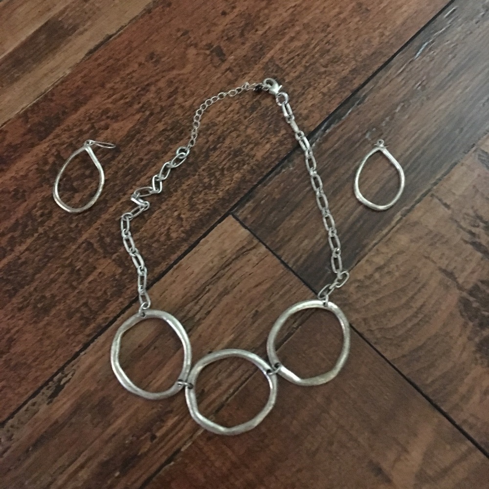 Hammered brushed silver necklace and earrings.